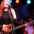 Pamela Falcon and her guitar