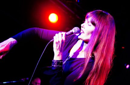 Pamela Falcon performing at a New York Nights show
